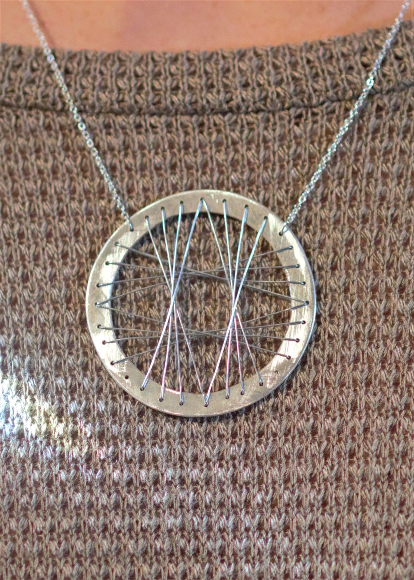 "Tierra" Circular Sterling Silver Wire Wrap Pendant